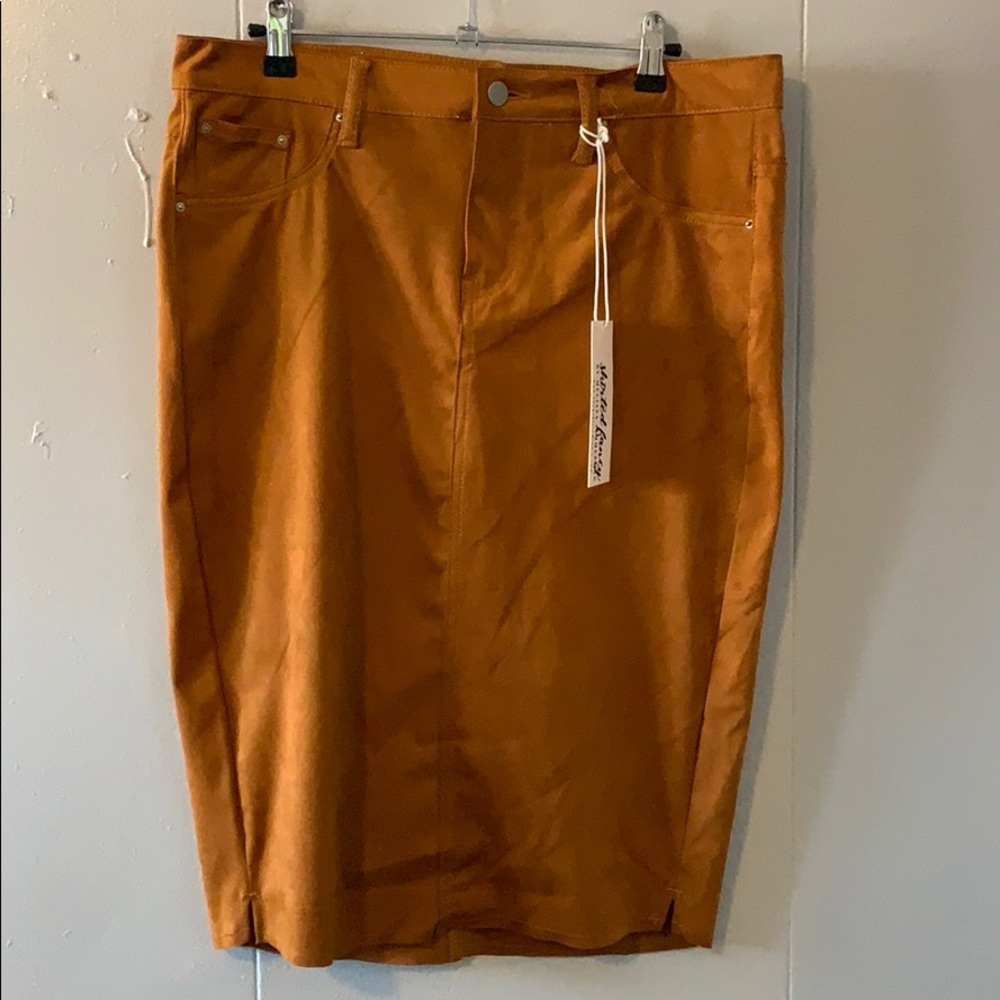 Skirted Fancy Cognac faux suede skirt.